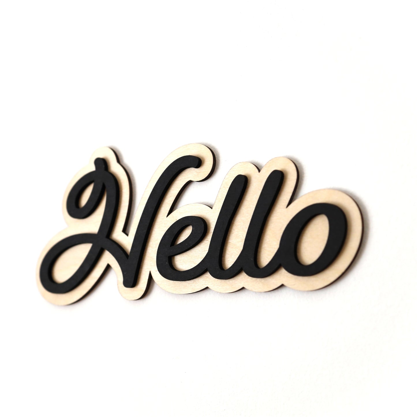 handcrafted 'Hello' sign with layered black design