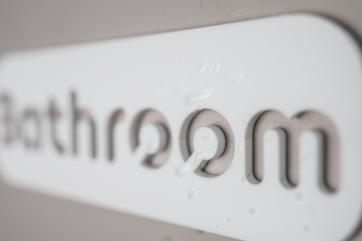 Waterproof "Bathroom" wall sign perfect for high-moisture environments