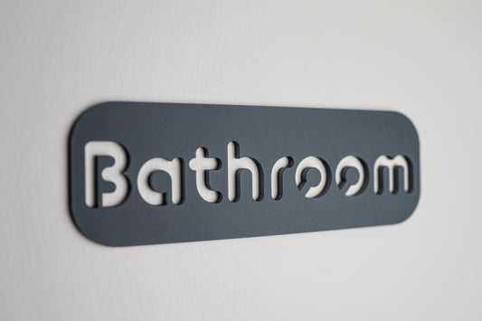 Waterproof bathroom door sign with black letters on grey stone texture acrylic