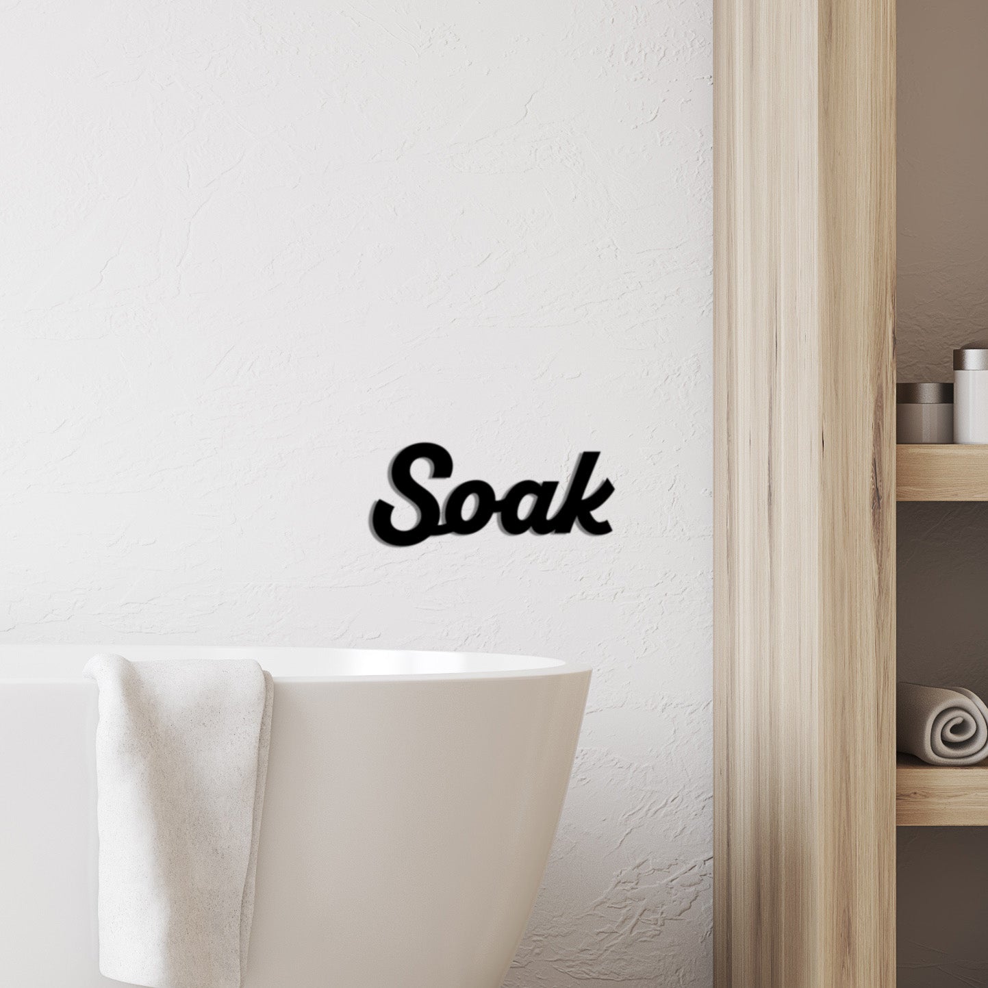 black "Soak" wall sign for bathroom decor