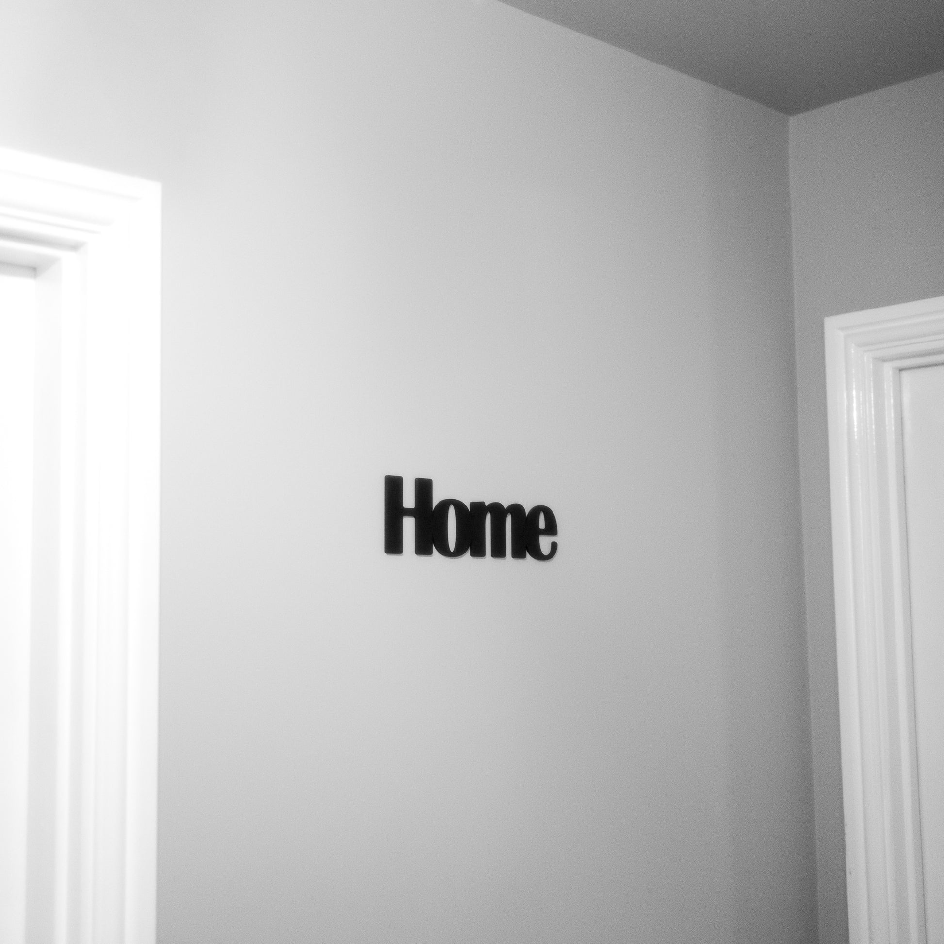 easy-to-install home wall sign with adhesive dots