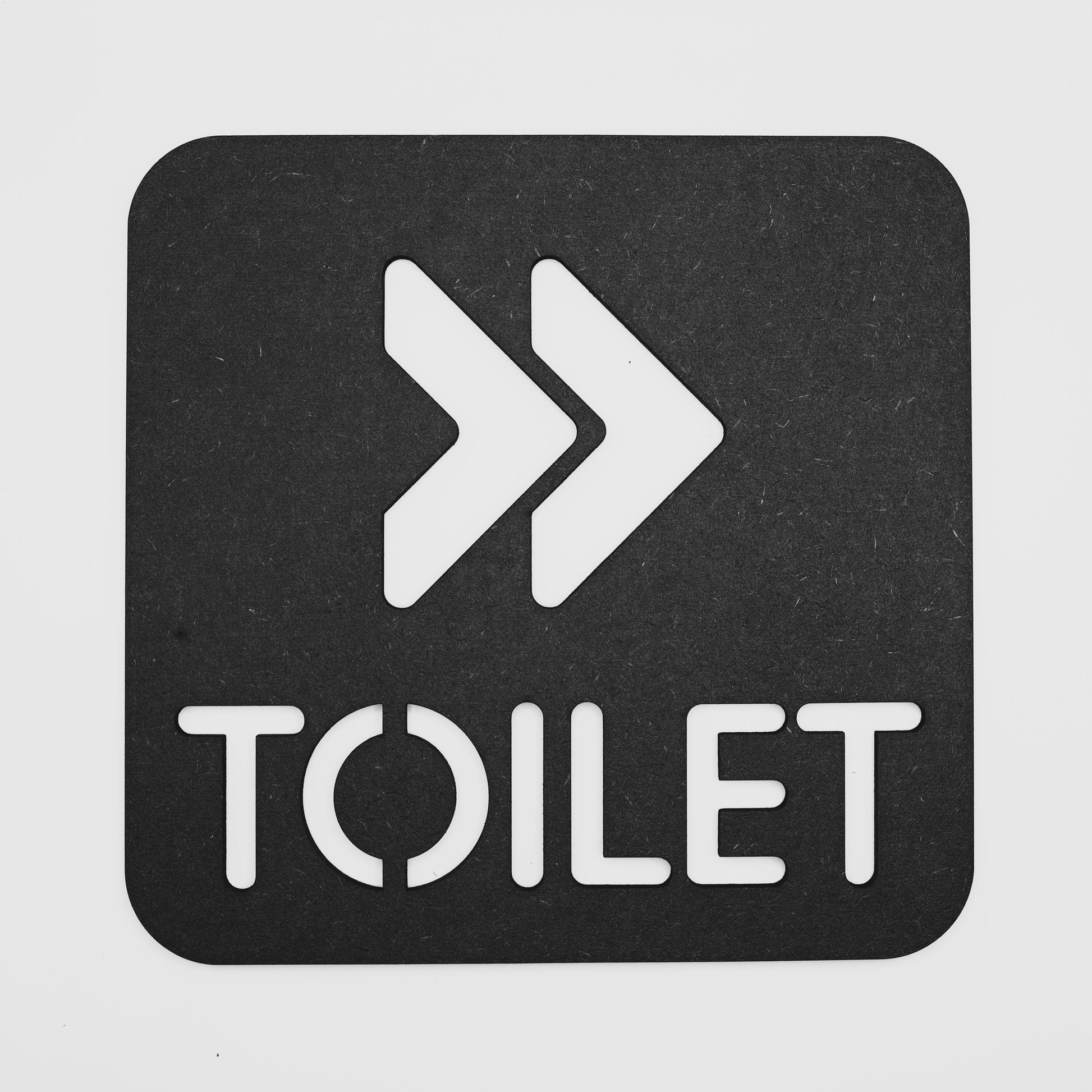 Modern black toilet directional sign with white arrows