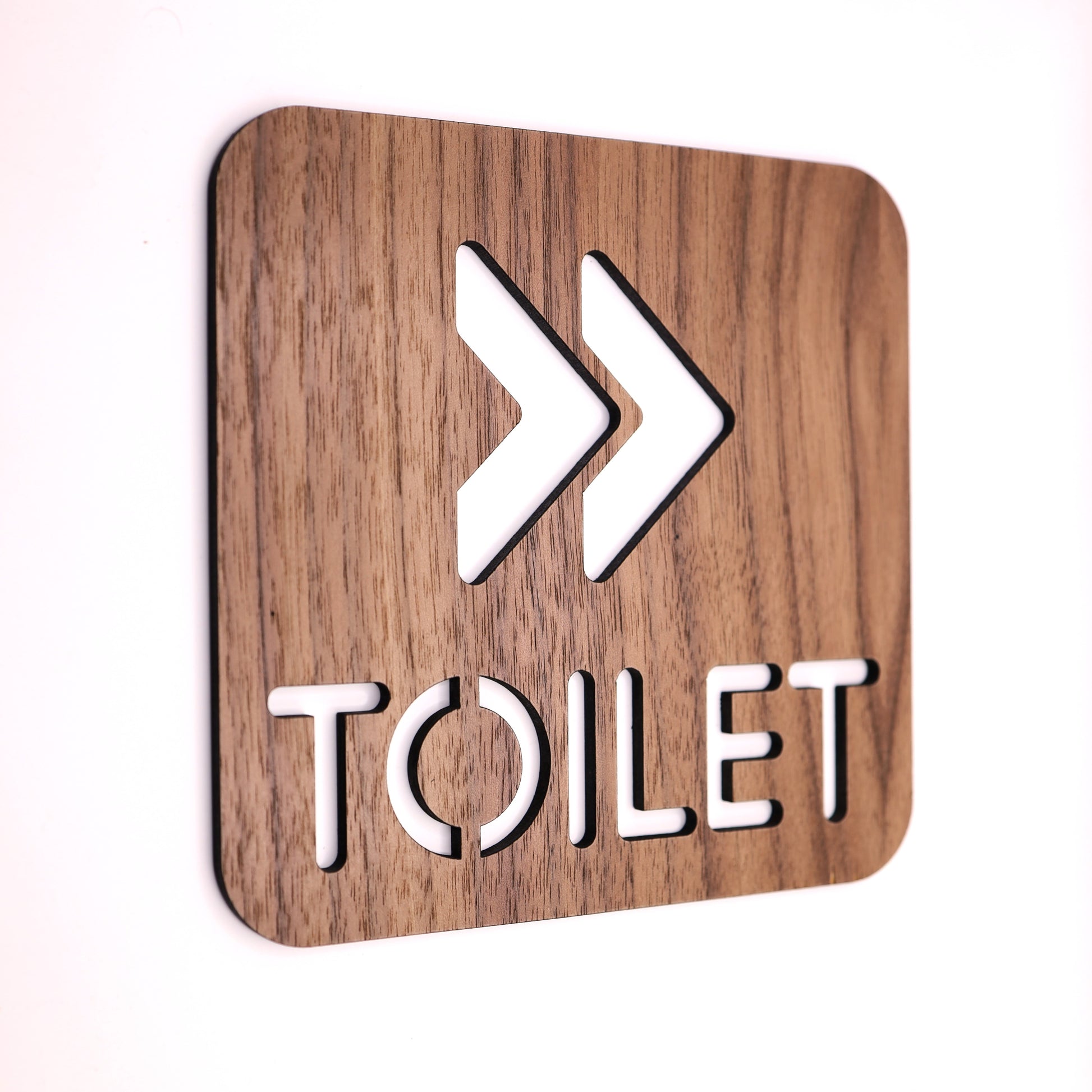 Premium walnut wood sign for guiding guests to the restroom with a sleek design.